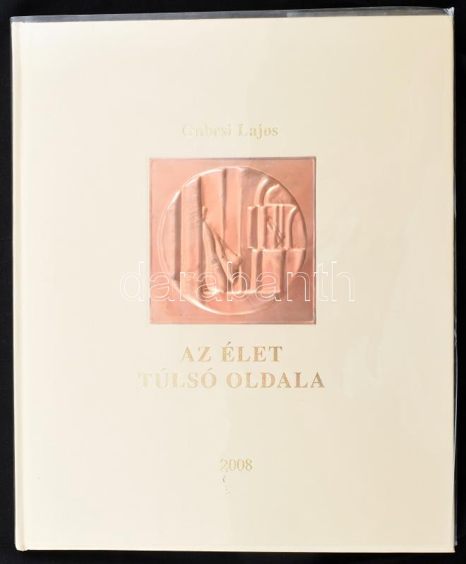 Gubcsi Lajos: Az élet túlsó oldala. Bp., 2008, GL-4 Kft. Harmadik kiadás. Gazdag képanyaggal illusztrálva. Kiadói aranyozott műbőr-kötés, a borítón réz plakettel, átlátszó műanyag védőborítóban, jó állapotban. A szerző