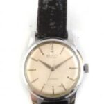 Dulfi kézi felhúzós mechanikus karóra, működő, jó állapotban, karcos óratok, plexi sérült d: 32 mm - Image 2