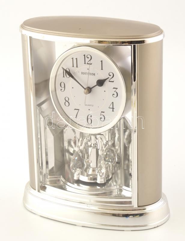 Modern torziós ingás asztali óra. Kvarc szerkezettel, Elemmel, működik, Műanyag. 24 cm