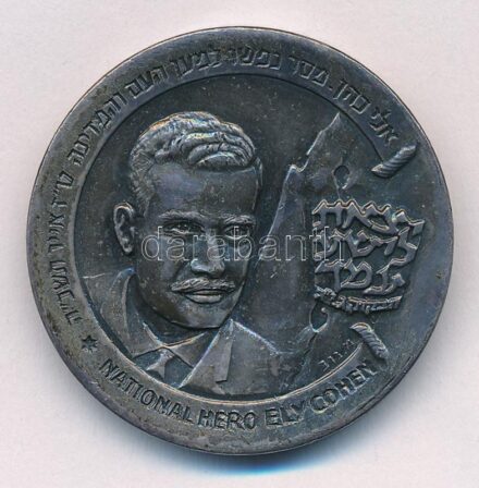 Izrael DN 'Eli Cohen, nemzeti hős' kétoldalas ezüstözött fém emlékérem, sérült műanyag tokban (35mm) T:1-,2 ph, kopott ezüstözés Israel ND 'National Hero Ely Cohen' two-sided silver-plated metal commemorative medallion in a damaged