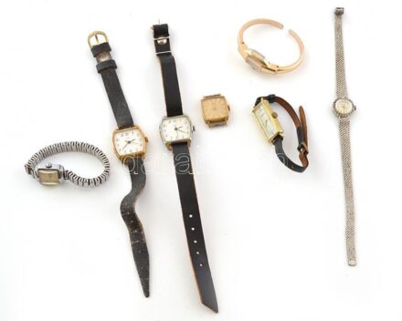 7 db vegyes mechanikus karóra, nagyrészt működik, kopásokkal, karcokkal.