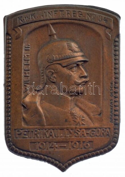 Osztrák-Magyar Monarchia 1916. 'K.u.K. JNFT. REG. No 34 - Petrikaiu - Wilhelm II' bronz sapkajelvény (41x29mm) T:1- / Austro-Hungarian Monarchy 1916. 'K.u.K. JNFT. REG. No 34 - Petrikaiu - Wilhelm II' bronze cap badge (41x29mm) C:AU