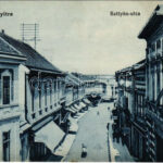 Nyitra, Nitra; Battyán utca, Dirnfeld Samu divat és kézműáruk raktárának üzlete. Heiman kiadása / street, shop