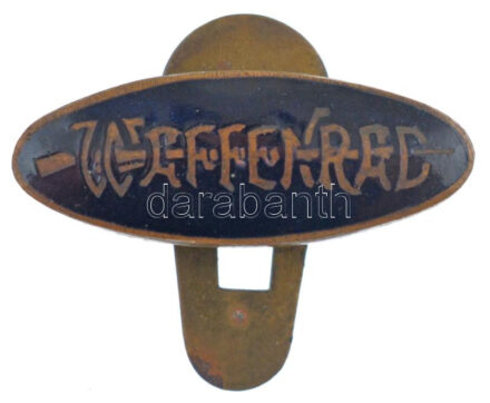 Ausztria ~1933-1934. 'Waffenrad' fekete zománcos gomblyukjelvény a Steyr Waffenrad kerékpár emblémájával (24x10mm) T:1- Austria ~1933-1934. 'Waffenrad' black enamel buttonhole badge with the emblem of the Steyr Waffenrad bicycle (24x10mm)