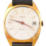 Siglo Quartz mechanikus svájci karóra, bőr szíjjal, kissé karcos tokkal, hátoldalán orosz nyelvű felirattal, d: 34 mm