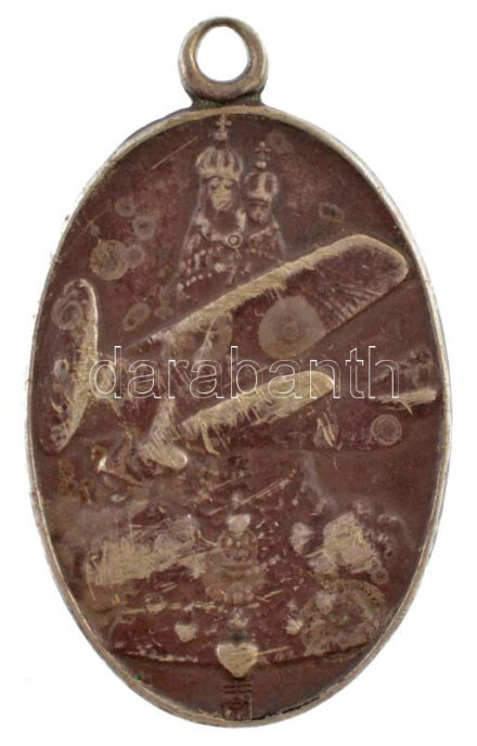 Tóth Gyula (1893-1970) ~1915. 'Borostyános Szent Szűz őrizz meg minket' ovális jelzett Ag repülős medál (5,13g/0.800/29x18mm) T:2 patina