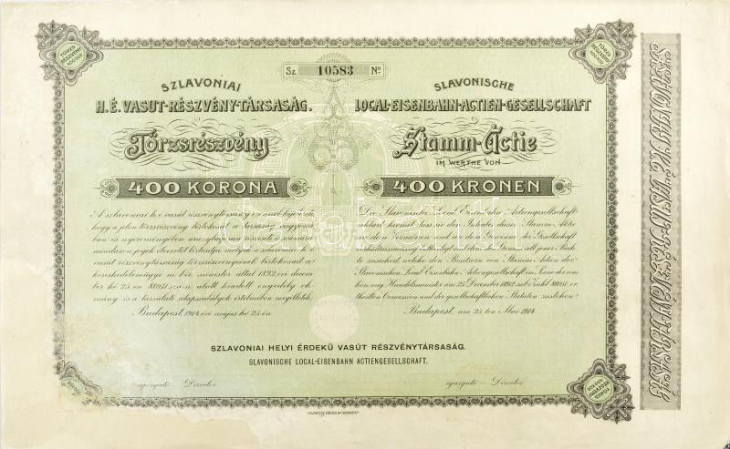 Budapest 1914. 'Szlavoniai H. É. (Helyi Érdekű) Vasut-Részvény-Társaság' törzsrészvénye 400K-ról szelvényekkel T:II bal alsó sarok jelentős területen restaurálva