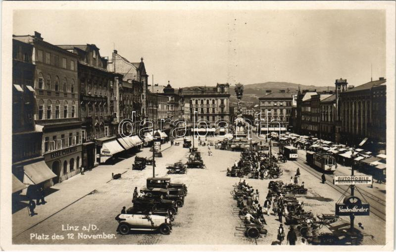 Linz, Platz des 12 November / square, automobiles, trams, Hotel Wolfinger, market (EK)