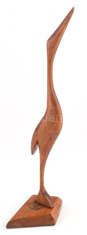 Stilizált daru, faragott fa szobor, asztali dísz. Alján 1968-as dátummal, felirattal. Kijár a talpból. m: 35 cm