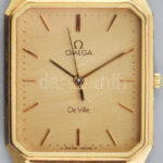 Omega De Ville kvarc karóra, bőr szíjjal, elem nélkül, 24x30 mm. Műanyag tokban.
