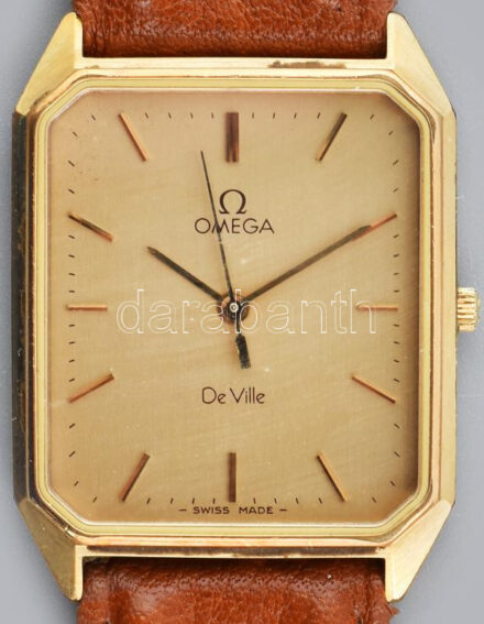 Omega De Ville kvarc karóra, bőr szíjjal, elem nélkül, 24x30 mm. Műanyag tokban.