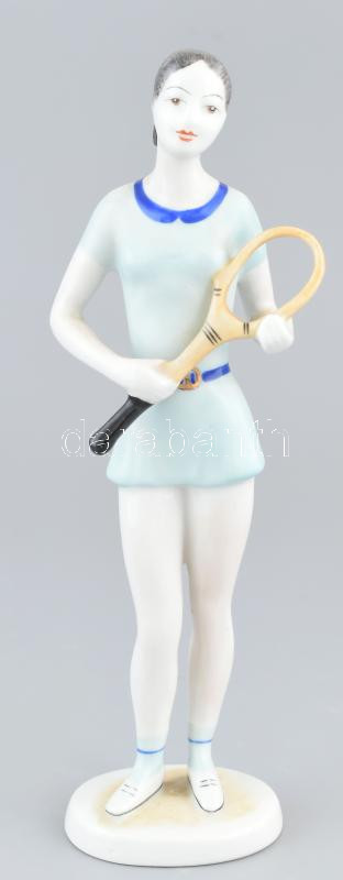 Hollóházi teniszező lány, kézzel festett porcelán, jelzett, korának megfelelő kopásokkal, m: 20 cm