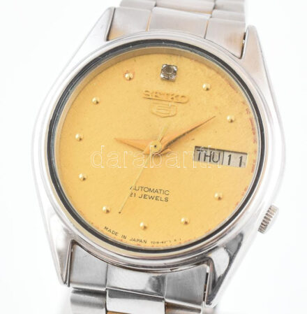 Seiko automata karóra dátum funkcióval, szép kockás számlappal, fém szíjjal, jó állapotban d: 34 mm
