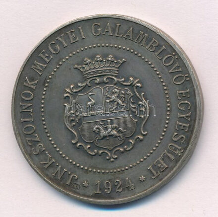 1931. 'J. N. K. Szolnok Megyei Galamblövő Egyesület' kétoldalas, jelzetlen Ag díjérem, hátoldalán '1931. VI. 13-14' gravírozással, 'SGA' gyártói jelzéssel (29,27g/40mm) T:1- patina