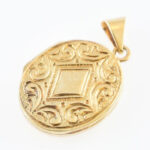 Arany (Au) 14K képtartó medál, jelzett, 2,5×1,5 cm, nettó: 4,7 g