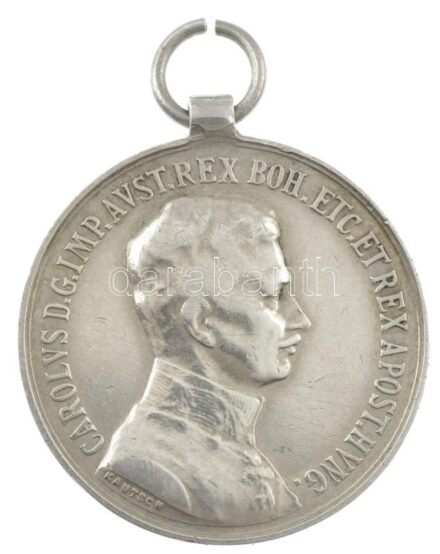 1917. 'Károly Ezüst Vitézségi Érem II. osztálya' Ag kitüntetés mellszalag nélkül. Szign.: Kautsch T:2- kis ph. Hungary 1917. 'Silver Gallantry Medal, 2nd Class' Ag decoration without ribbon. Sign.: Kautsch C:VF small edge error NMK: 306.