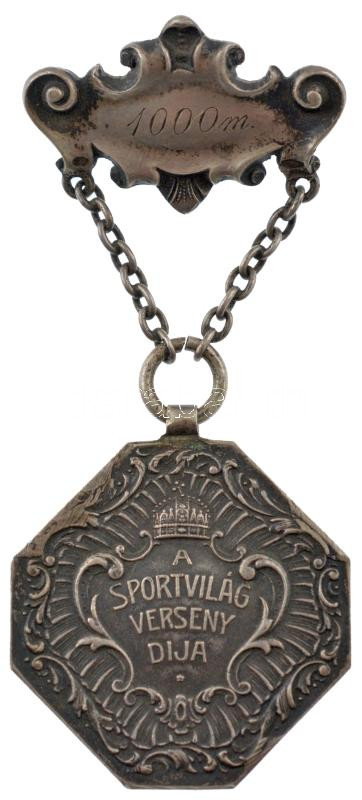1898. 'A Sportvilág Verseny Díja' kétoldalas, peremén jelzett Ag sport díjérem, díszítménnyel, peremén 'SGA' gyártói jelzéssel, hátoldalán '1898. II. díj' gravírozással, a díszítményen '1000m' gravírozással