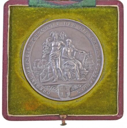 Ausztria 1911. 'Bécsi Kereskedelmi Iskola / Kiváló tanuló - Josef Humer' jelzett Ag emlékérem, gravírozással, eredeti, sérült tokban (59mm) T:2 ph. Austria 1911. 'Gremial Handelsfachschule des Wiener Handelsstandes / Ihrem