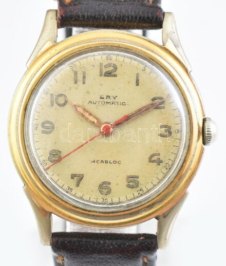 Ery automata bumper férfi karóra, fém tokkal, enyhén pöttyös számlappal. bőr szíjjal, működő, jó állapotban, karcos üveggel d: 32 mm