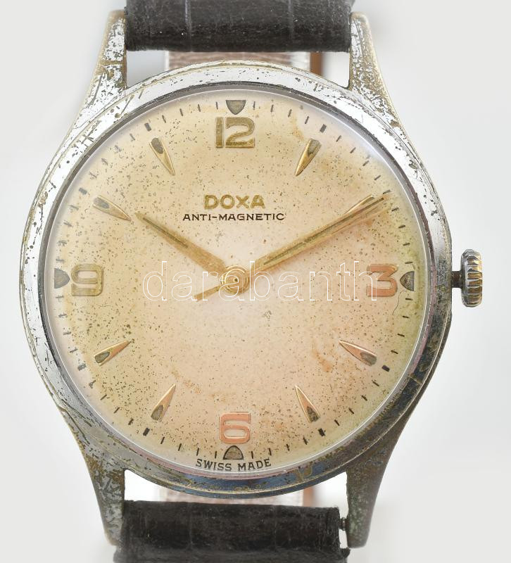 Doxa kézi felhúzós karóra. Szép számlappal, működő, jó állapotban, bőr szíjjal. d: 35 mm