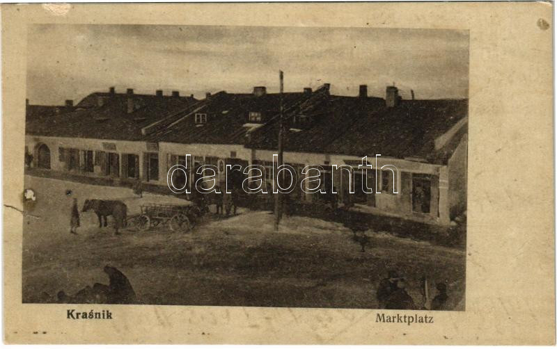 1916 Krasnik, Marktplatz / market square in winter, shops (tear)