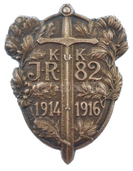 Osztrák-Magyar Monarchia 1916. 'K.u.K. 82-es Gyalogezred jevénye' dombornyomott bronz kitűző (50x38mm) T:1-,2 Austro-Hungarian Monarchy 1916. 'K.u.K. Badge of the 82nd Infantry Regiment' embossed bronze badge (50x38mm) C:AU,XF