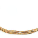 Arany (Au/18k) fehér és sárga arany, 4 soros karkötő, h: 20 cm, nettó: 30 g, jelzett.