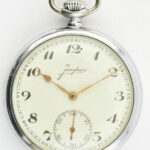Junghans fém tokos zsebóra, hibátlan számlappal, hátoldalán monogrammal. szép, működő állapotban d: 50 mm