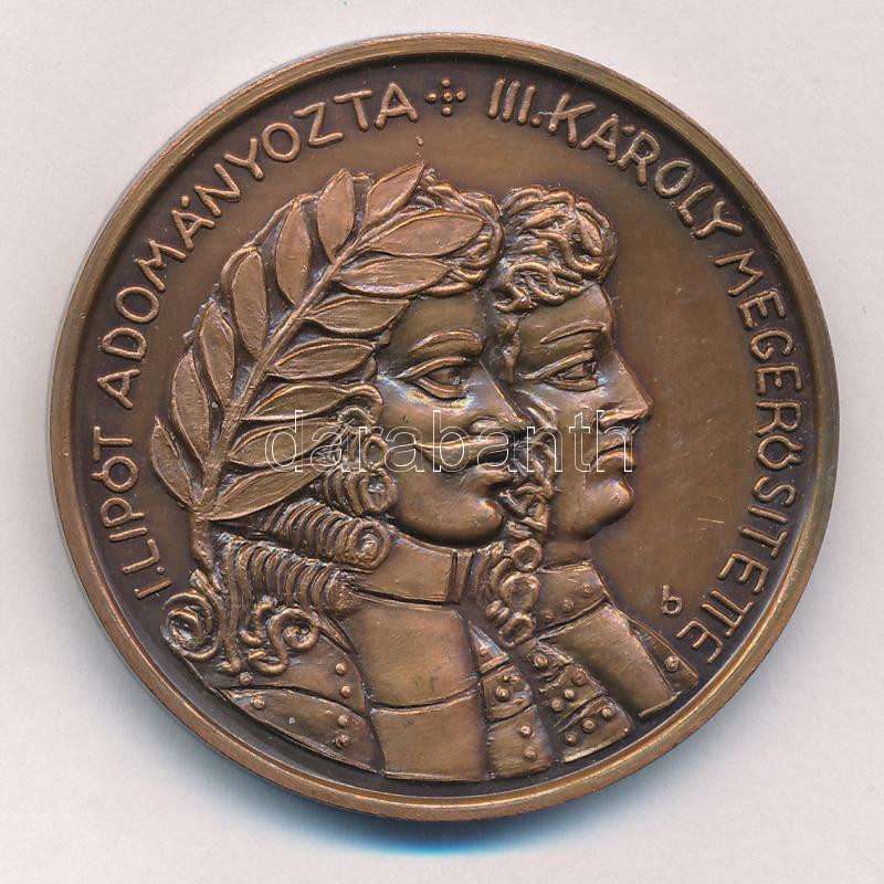 Bartos Endre (1930-) 1986. 'MÉE Baja - I. Lipót - III. Károly / Baja Mezőváros' bronz emlékérem (42,5mm) T:1 Adamo BA1