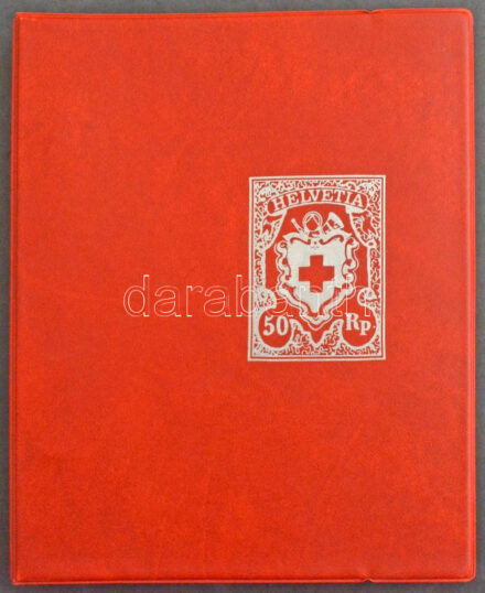 'HELVETIA' négygyűrűs berakó 30db osztás nélküli berakólappal, használt de rendkívül jó állapotban