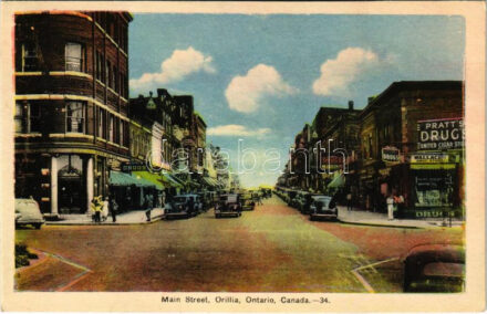 1945 Orillia (Ontario), Main Street, automobiles, Pratt's Drugs, United Cigar Store, Wallace's Drugstore