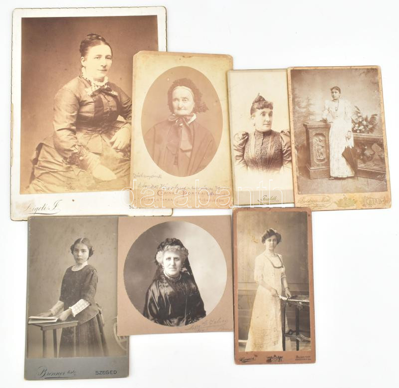 cca 1890-1900 Idősebb és fiatal hölgyek portréi, 7 db keményhátú fotó, különböző műtermekből (Goldstein Márk, Baja; Brenner Testvérek, Szeged; Szinay és Társa, Miskolc; stb.), részben feliratozva, vegyes állapotban, 12x7,5 cm