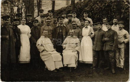 1915 WWI German military hospital, group of injured soldiers, Red Cross nurses and monks. photo + 'Vereinslazarett Dominikanerkonvent Düsseldorf, Herzogstr. 17' (EK)