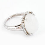 Ezüst (Ag) gyűrű holdkővel 6,15ct és cirkónnal 0,19ct jelzett, tanúsítvánnyal 4,61 g m:52