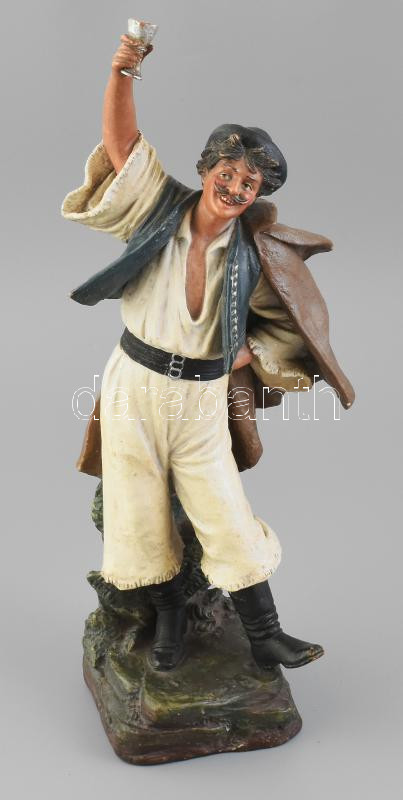 Bernard Bloch 1836-1909): Magyar legény. Hidegen festett fajansz, jelzett, korának megfelelő állapotban, jelzett, m: 38 cm