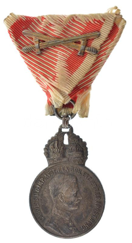 1917. 'Károly Ezüst Katonai Érdemérem a katonai érdemkereszt szalagján, kardokkal' ezüstözött hadifém kitüntetés hadiszalagon T:XF kopott ezüstözés, viseltes mellszalag Hungary 1917. 'Silver Militarty Order of Merit on wartime