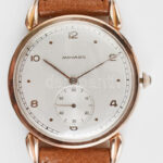 Movado 14K arany kézi felhúzós férfi karóra. Jelzett, hibátlan számlappal, bőr sz íjjal 32 mm