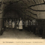 La Champagne. Travail du Vin de Champagne, La mise sur pointe / champagne factory, interior with workers