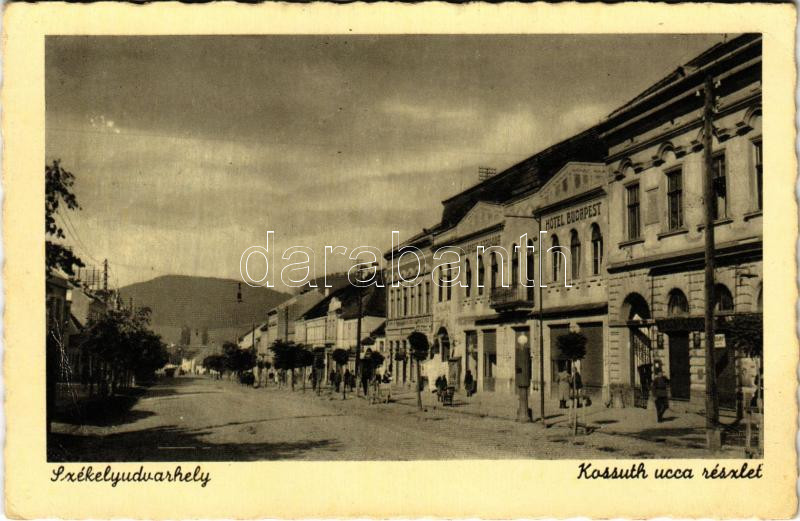 Székelyudvarhely, Odorheiu Secuiesc; Kossuth utca, Budapest szálloda, üzletek. Soha Aladár kiadása / street view, hotel, shops (ázott / wet damage)
