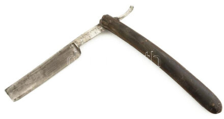 Solingen borotva, kopásokkal, h: 15,5 cm