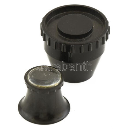 Órás nagyító, kissé homályos, ragasztott, tokban.