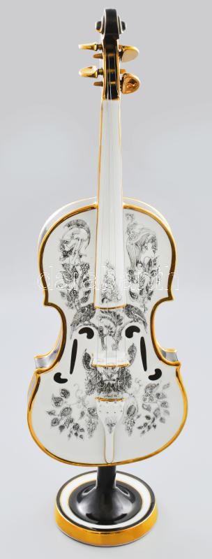 Hollóházi Porcelángyár, Szász Endre (Csíkszereda, 1926 - Mosdós, 2003): Hegedű. Hegedű alakú porcelán. Aranyozott fekete keretezésben fantasztikus jelenetek. Kézzel festett, jelzett, hibátlan (az aranyozáson minimális kopás). Asztali tartóval h: 65