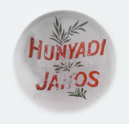 cca 1930 "Hunyadi János" keserűvíz reklámos levélnehezék, kopott, karcolásokkal, d: 8 cm.