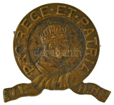 Osztrák-Magyar Monarchia ~1914-1918. "Magyar Királyi 1. Honvéd Huszárezred" tombak sapkajelvény. "I. H.H. PRO REGE ET PATRIA" (29x27mm) T:AU / Austrian-Hungarian Monarchy ~1914-1918. "Hungarian Royal 1st Honved Hussar Regiment" tombac cap badge (29x27mm)