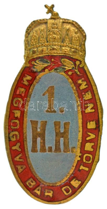 Osztrák-Magyar Monarchia ~1914-1918. "Magyar Királyi 1. Honvéd Huszárezred" aranyozott, zománcozott bronz sapkajelvény. "MEGFOGYVA BÁR DE TÖRVE NEM" (36x18mm) T:XF zománchiba / Austrian-Hungarian Monarchy ~1914-1918. "Hungarian Royal 1st Honved Hussar Reg