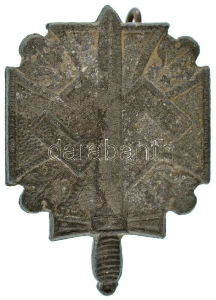 Német Harmadik Birodalom ~1940-1945. "Winterhilswerk (Téli Segélyszervezet)" Zn jelvény, hátoldalán "W14" gyártói jelzéssel (29x20mm) T:XF oxidáció / German Third Reich ~1940-1945. "Winterhilswerk" Zn badge, with "W14" maker's mark on the back (29x20mm) C