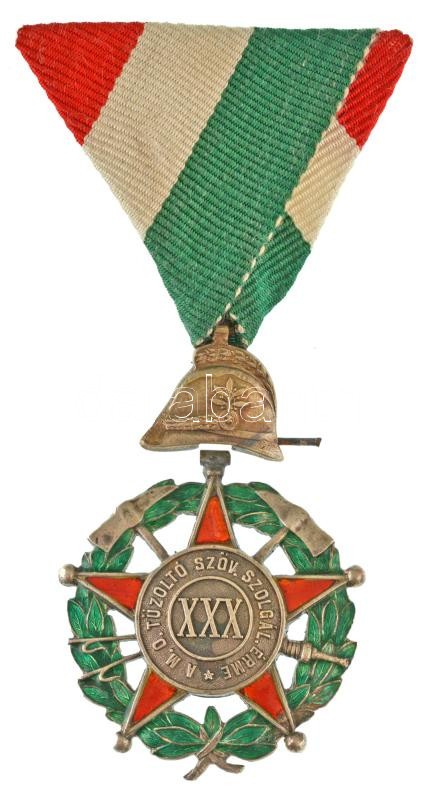 1884. "A M. O. Tűzoltó Szöv. Szolgálati Érme 30. éves szolgálat után" hátoldalon jelzett Ag kitüntetés, kör alakú medál zománcozott babérkoszorú által közrefogott ötágú csillagba foglalva, "HK" gyártói jelzéssel, mellszalaggal T:XF zománchiba, a csillag e